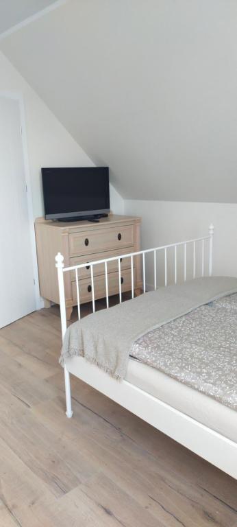 Postel nebo postele na pokoji v ubytování Apartamenty Heweliusz House