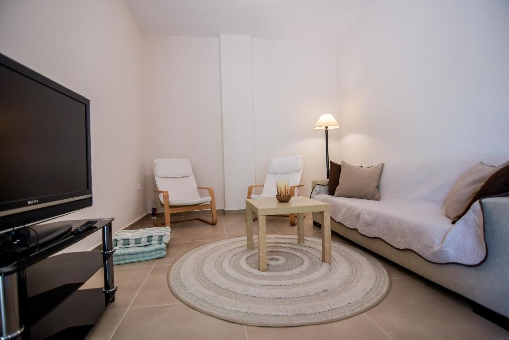 A television and/or entertainment centre at Kiani Akti Villas