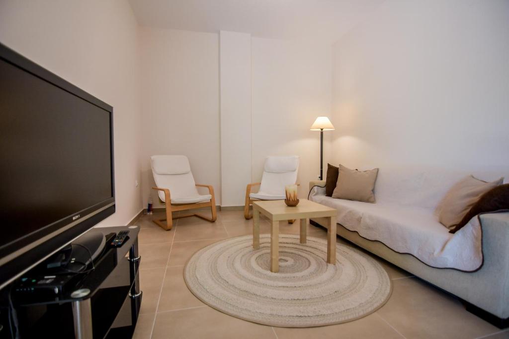 A television and/or entertainment centre at Kiani Akti Villas