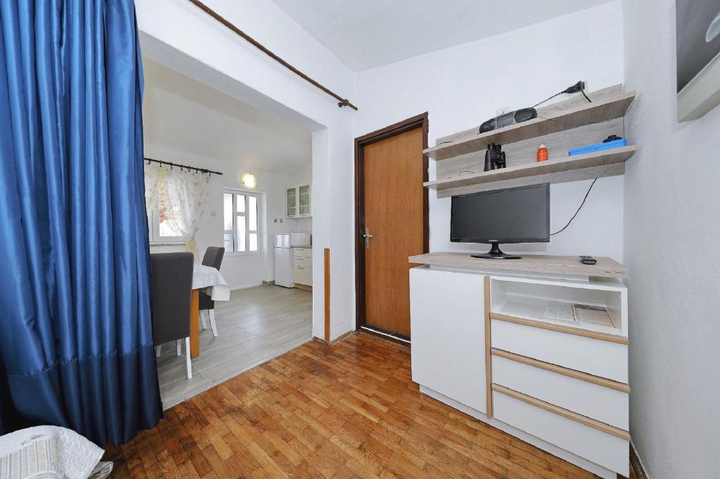 TV a/nebo společenská místnost v ubytování House Tony