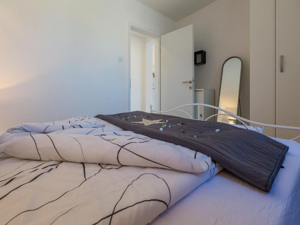 Postel nebo postele na pokoji v ubytování Apartments LAVARIN