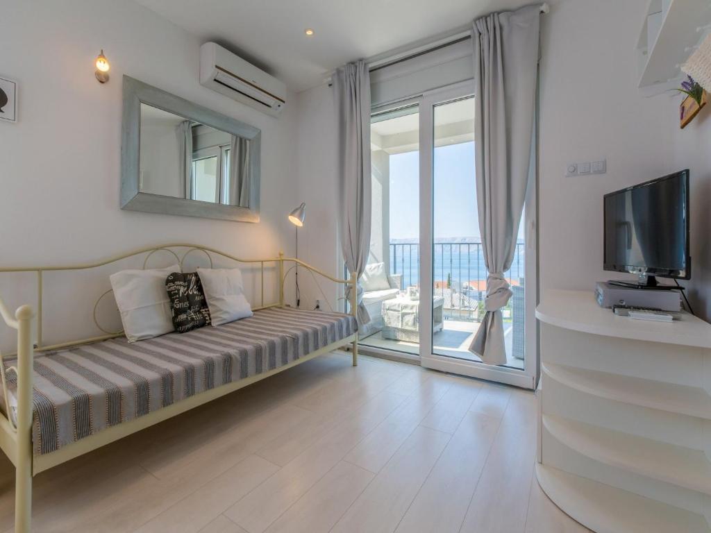 Postel nebo postele na pokoji v ubytování Apartments LAVARIN