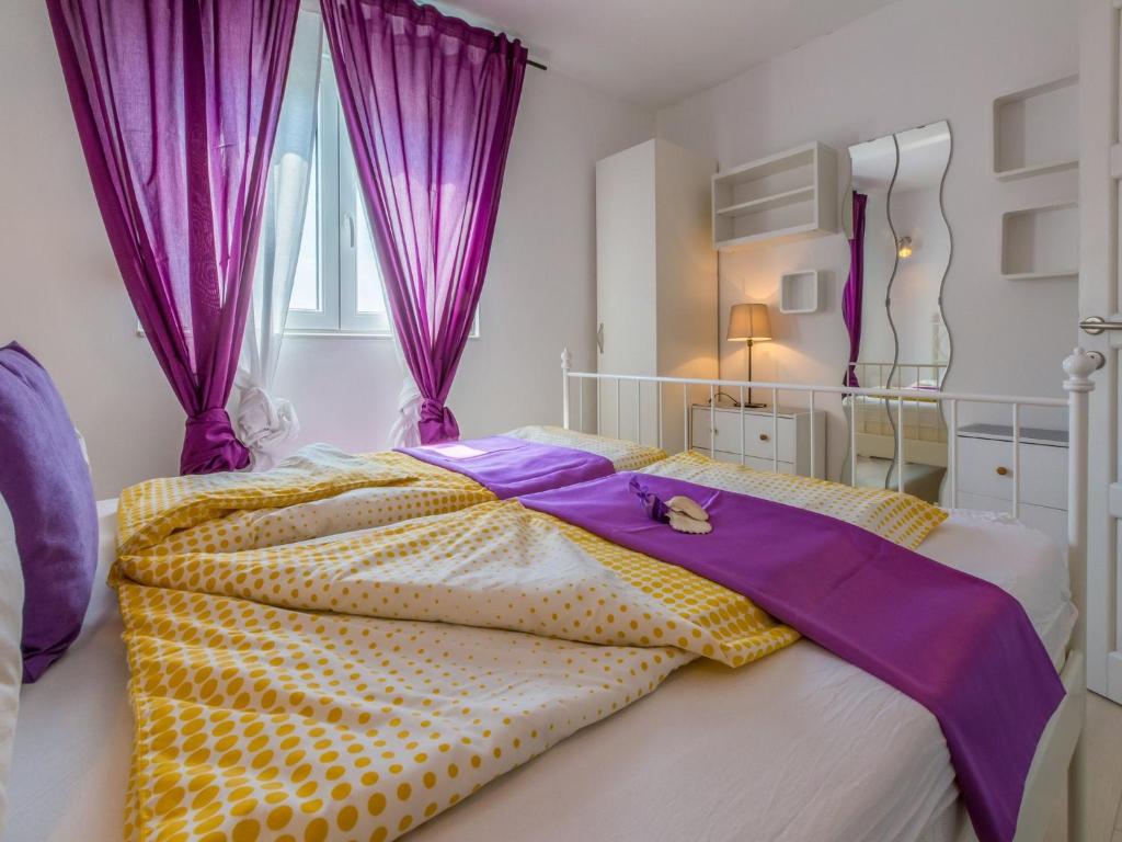 Postel nebo postele na pokoji v ubytování Apartments LAVARIN