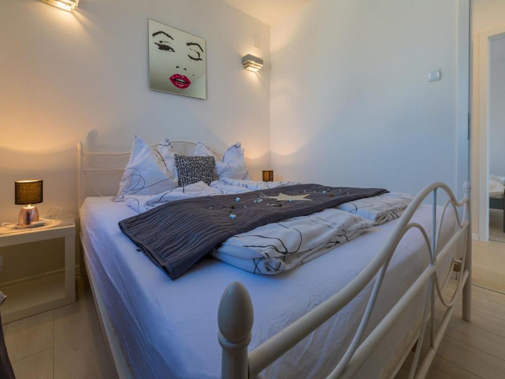 Postel nebo postele na pokoji v ubytování Apartments LAVARIN