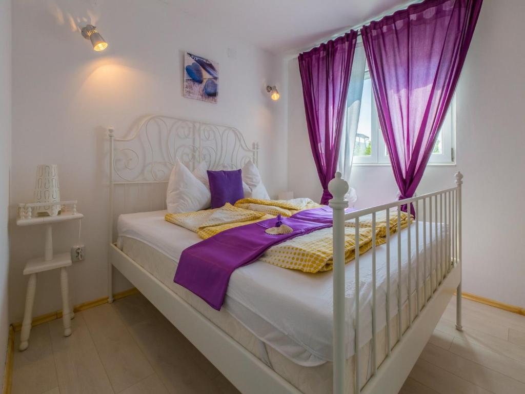 Postel nebo postele na pokoji v ubytování Apartments LAVARIN