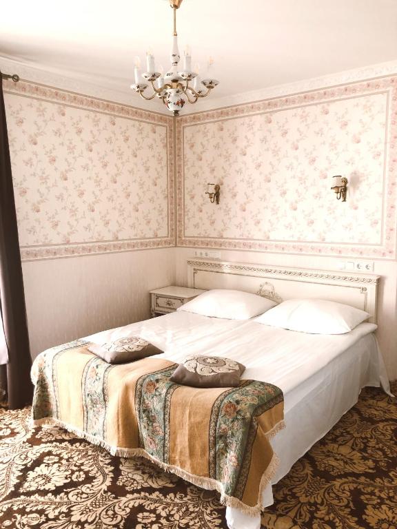 Postel nebo postele na pokoji v ubytování Ööbikuoru Villa