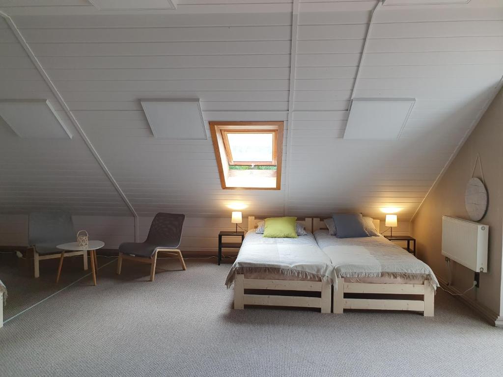 Postel nebo postele na pokoji v ubytování Surf Inn