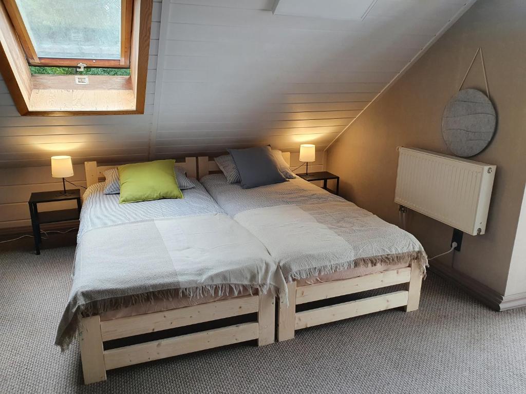 Postel nebo postele na pokoji v ubytování Surf Inn