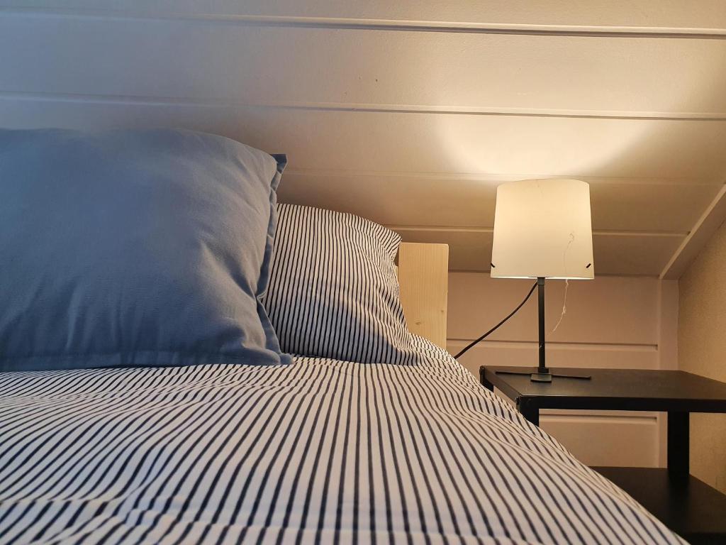 Postel nebo postele na pokoji v ubytování Surf Inn