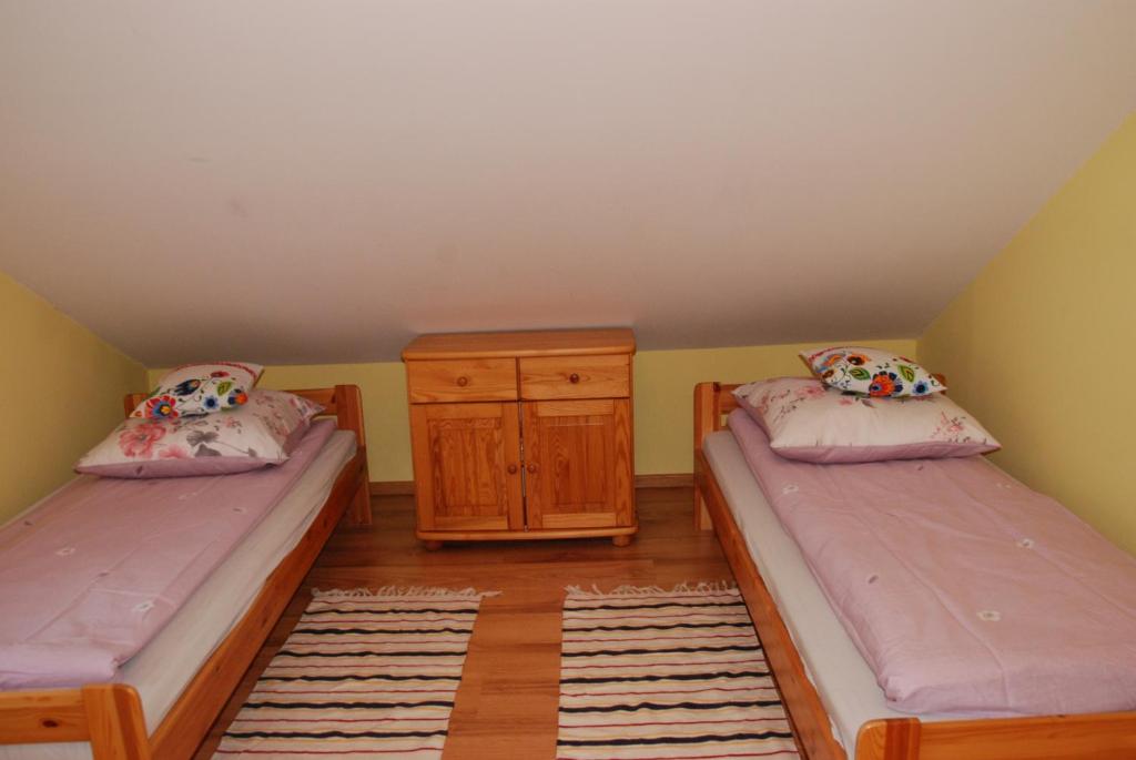 Postel nebo postele na pokoji v ubytování Apartament Jawornik