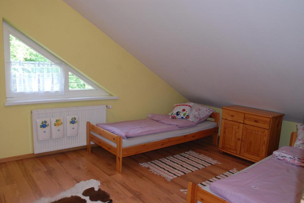 Postel nebo postele na pokoji v ubytování Apartament Jawornik