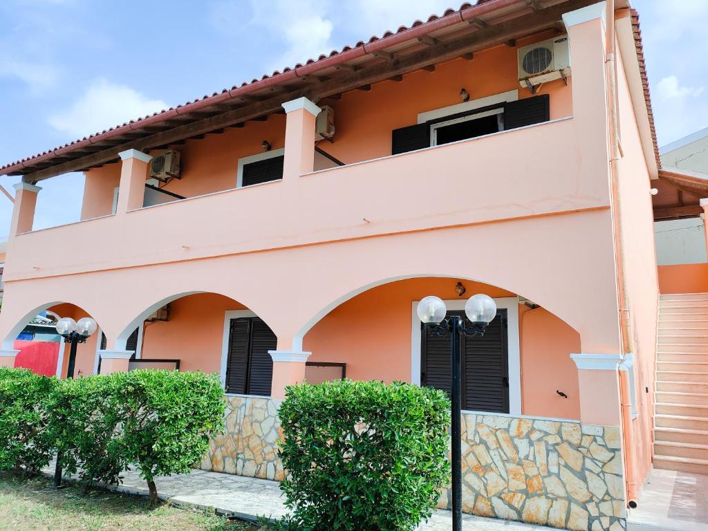 a house with an orange at Anna Garden Sidari in Sidari