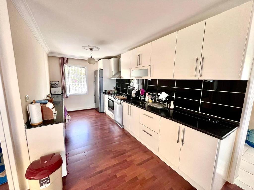 A kitchen or kitchenette at BODRUM BURCU VILLA , Magnificent Sea View, Cozy, Free Otopark, Free Wifi