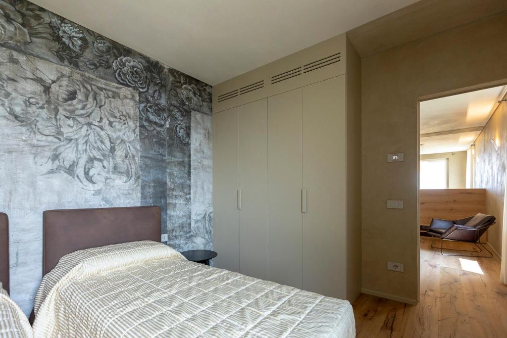 Postel nebo postele na pokoji v ubytování Eremus Relais