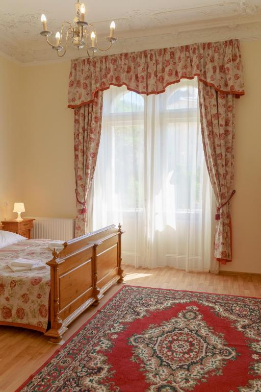Postel nebo postele na pokoji v ubytování Hotel Heluan