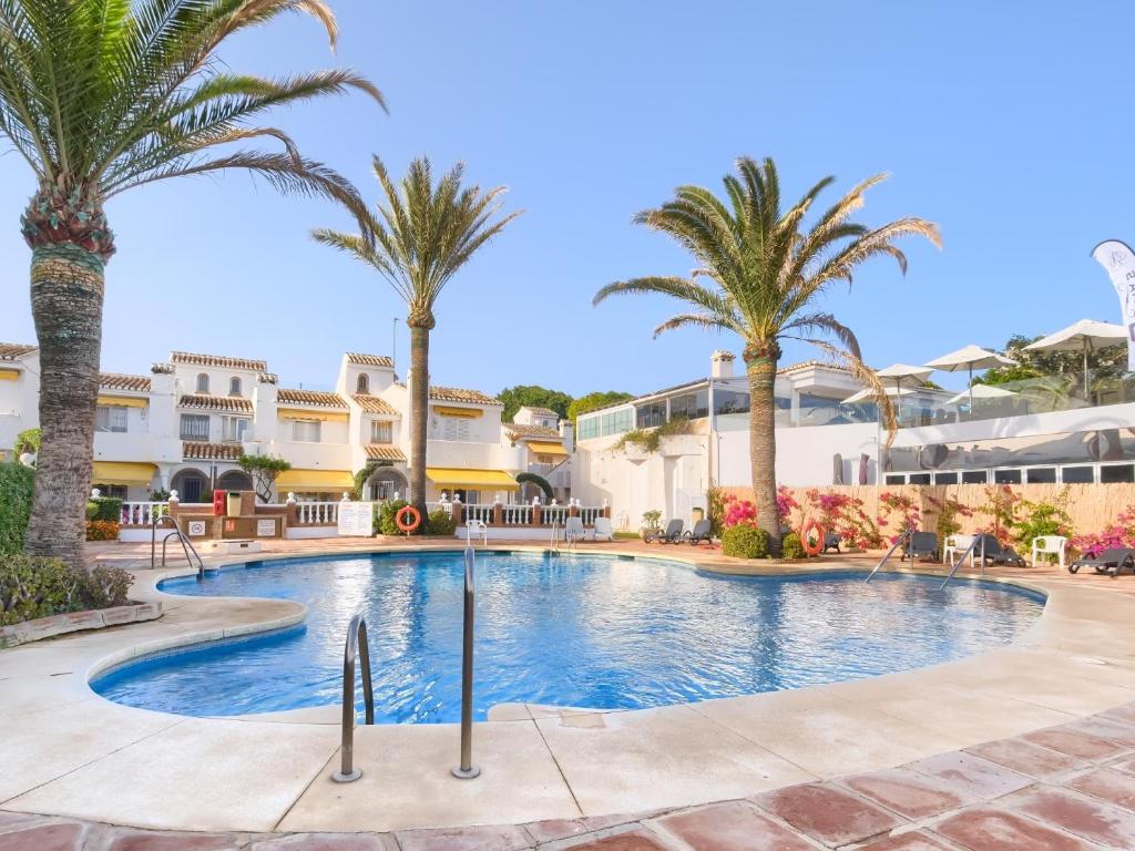 Bazén v ubytovaní 31 Mijas Playa Club townhouse La Cala alebo v jeho blízkosti