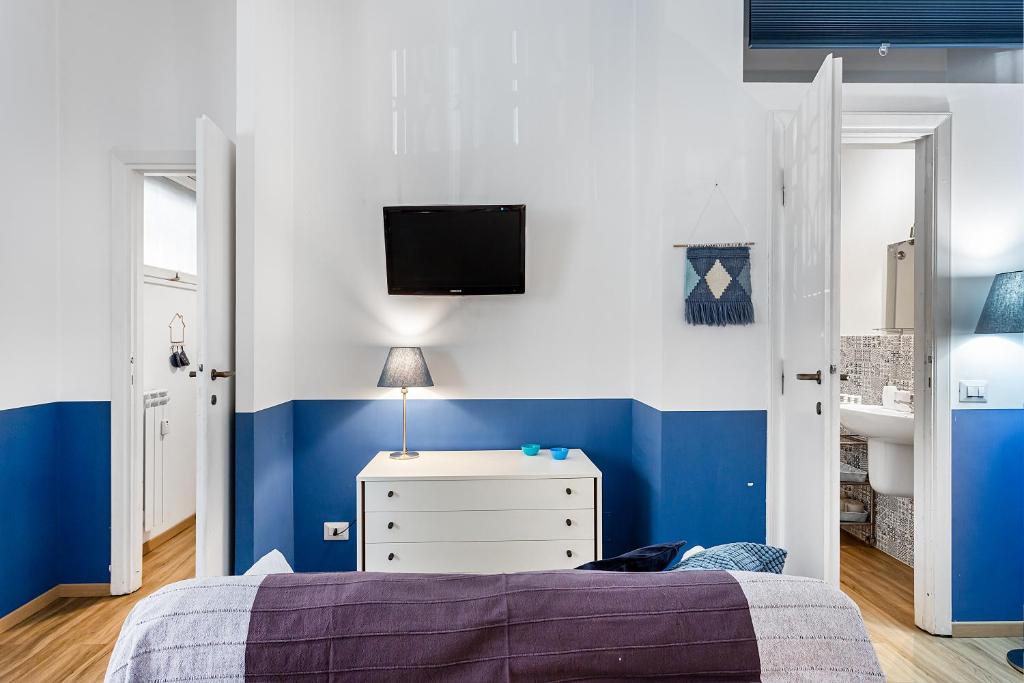 A bed or beds in a room at True Blue Casa Vacanze