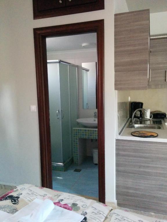 Kuchyň nebo kuchyňský kout v ubytování Attalos Apartments