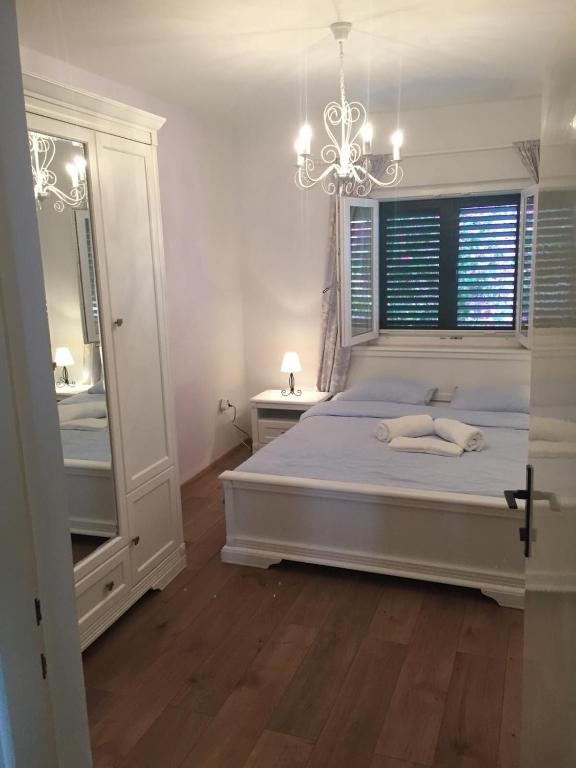 Ein Bett oder Betten in einem Zimmer der Unterkunft Apartments Damir - Katarina