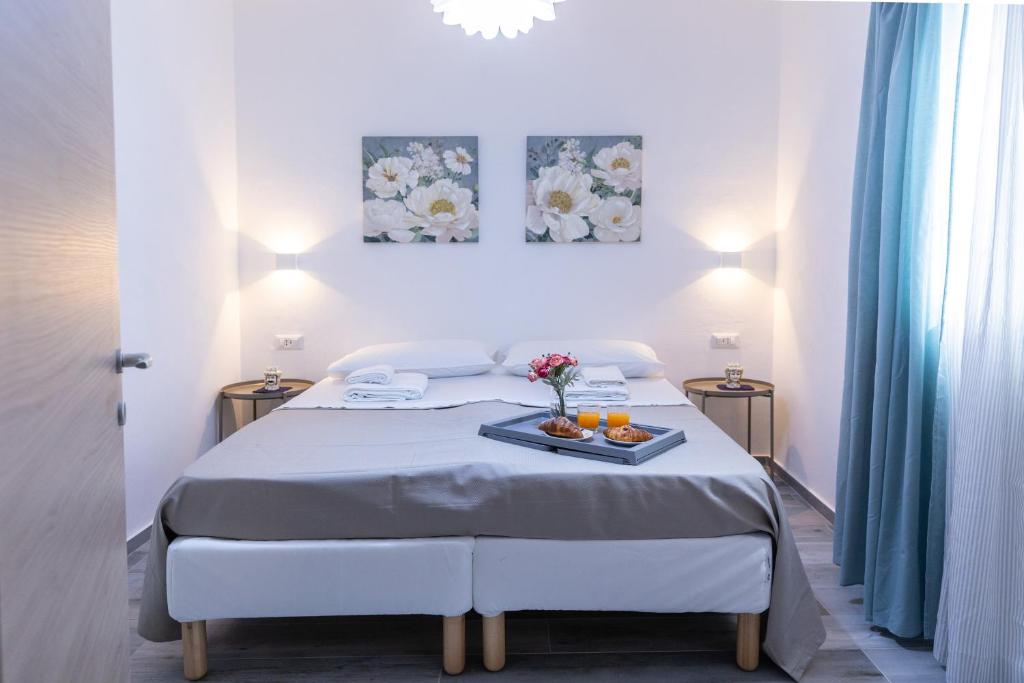 Posteľ alebo postele v izbe v ubytovaní Villa Pasitea fronte mare