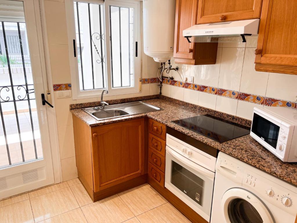 Kuchyň nebo kuchyňský kout v ubytování Apartamento Deluxe Jardín