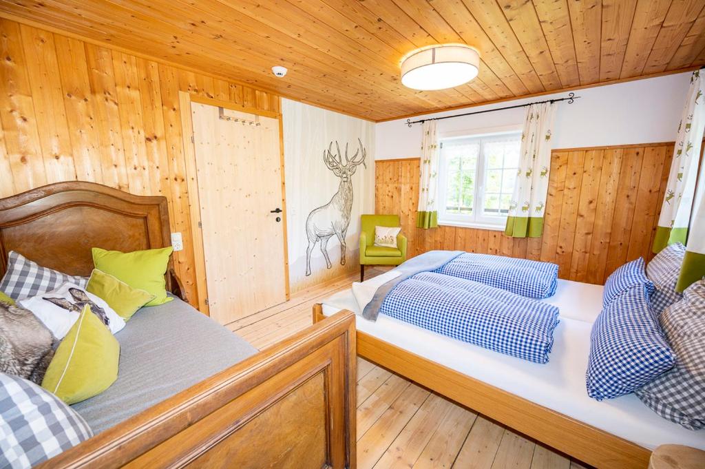 Postel nebo postele na pokoji v ubytování Wuerttemberger Haus - Hütte