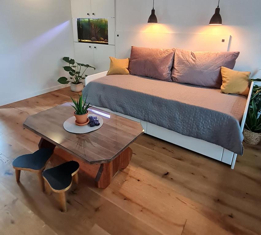 Postel nebo postele na pokoji v ubytování FRIZ&FANY Postojna City Center
