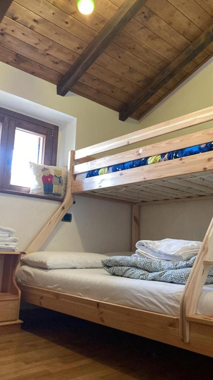 Postel nebo postele na pokoji v ubytování Chalet Mirastelle