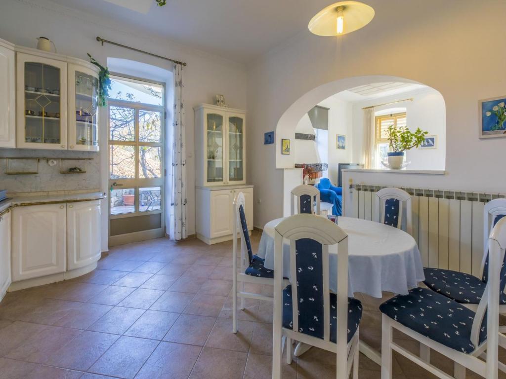 Kuchyň nebo kuchyňský kout v ubytování Apartment Piano