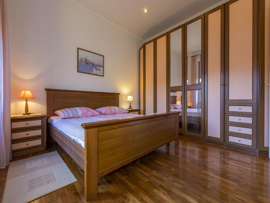 Postel nebo postele na pokoji v ubytování Apartment Piano
