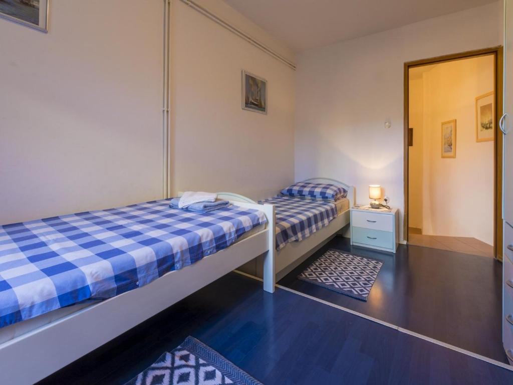 Postel nebo postele na pokoji v ubytování Apartment Piano