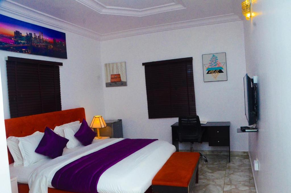 Postel nebo postele na pokoji v ubytování J Gibson Hotel