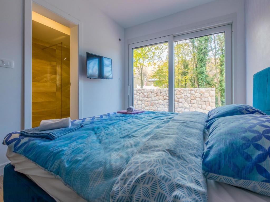 Postel nebo postele na pokoji v ubytování Villa Adry