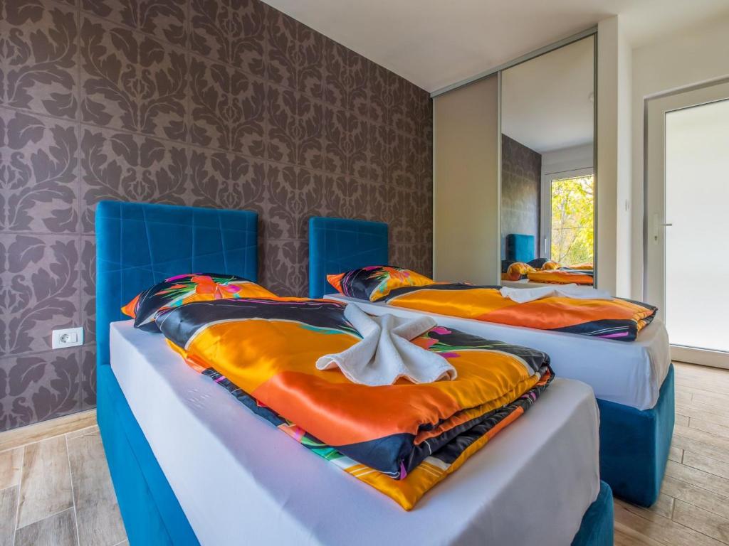 Postel nebo postele na pokoji v ubytování Villa Adry