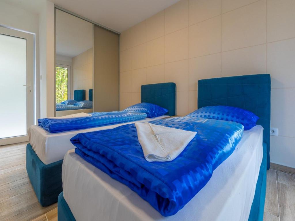 Postel nebo postele na pokoji v ubytování Villa Adry