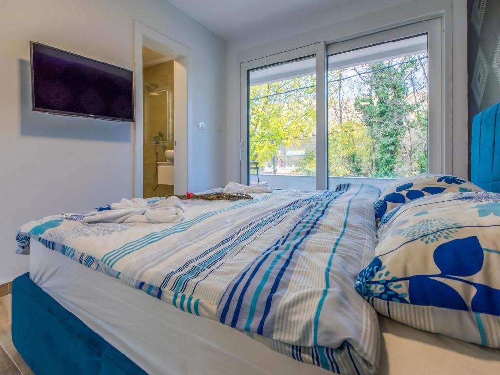 Postel nebo postele na pokoji v ubytování Villa Adry