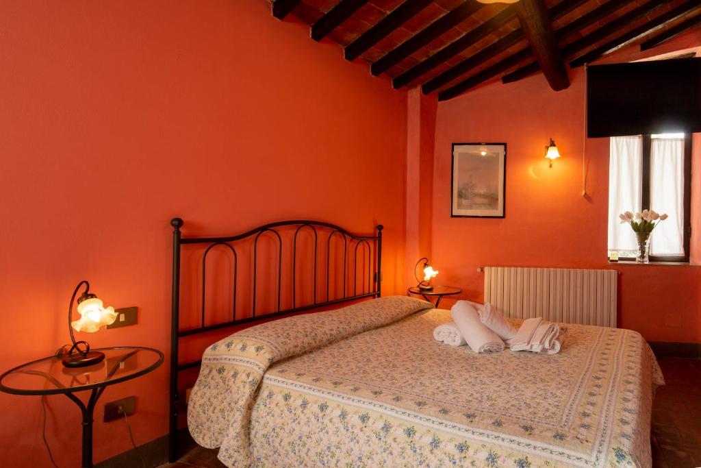 Posteľ alebo postele v izbe v ubytovaní Casa al Monte by VacaVilla