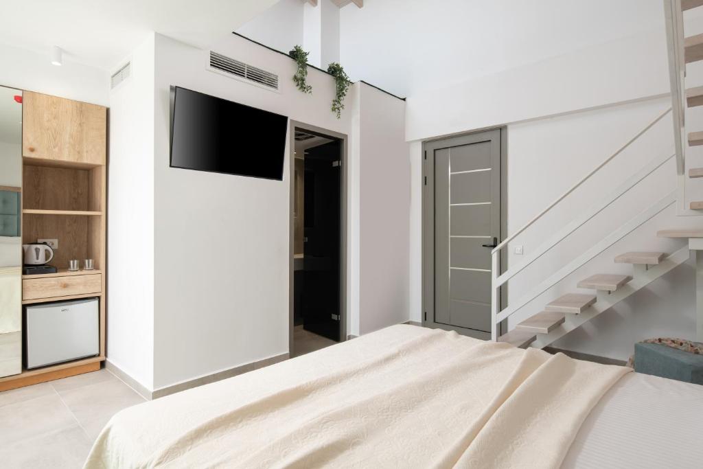 Kuchyň nebo kuchyňský kout v ubytování Hanioti Central Hotel