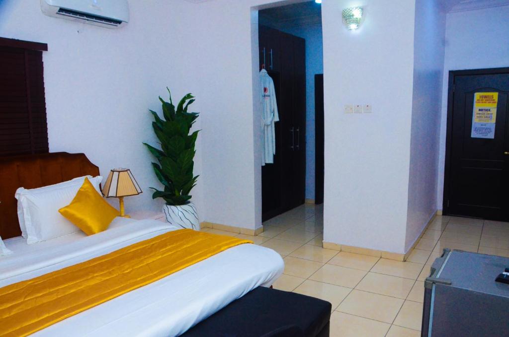 Postel nebo postele na pokoji v ubytování J Gibson Hotel