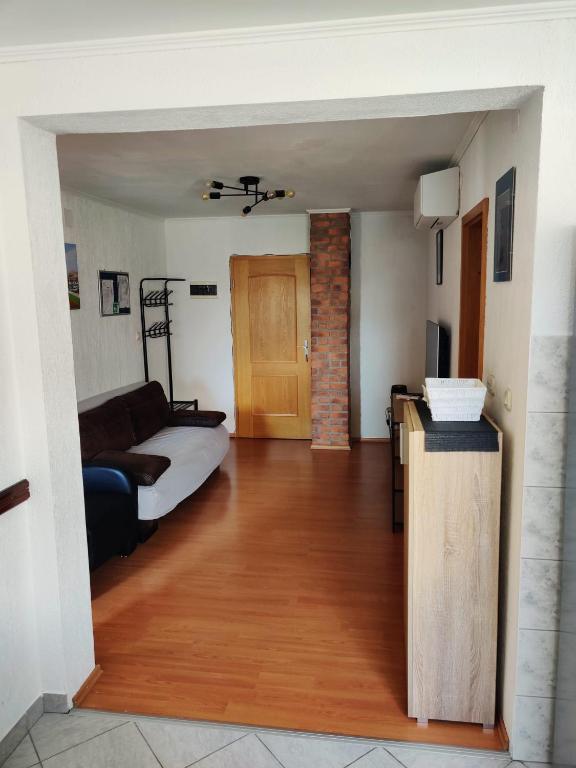 Postel nebo postele na pokoji v ubytování Sanda Residence