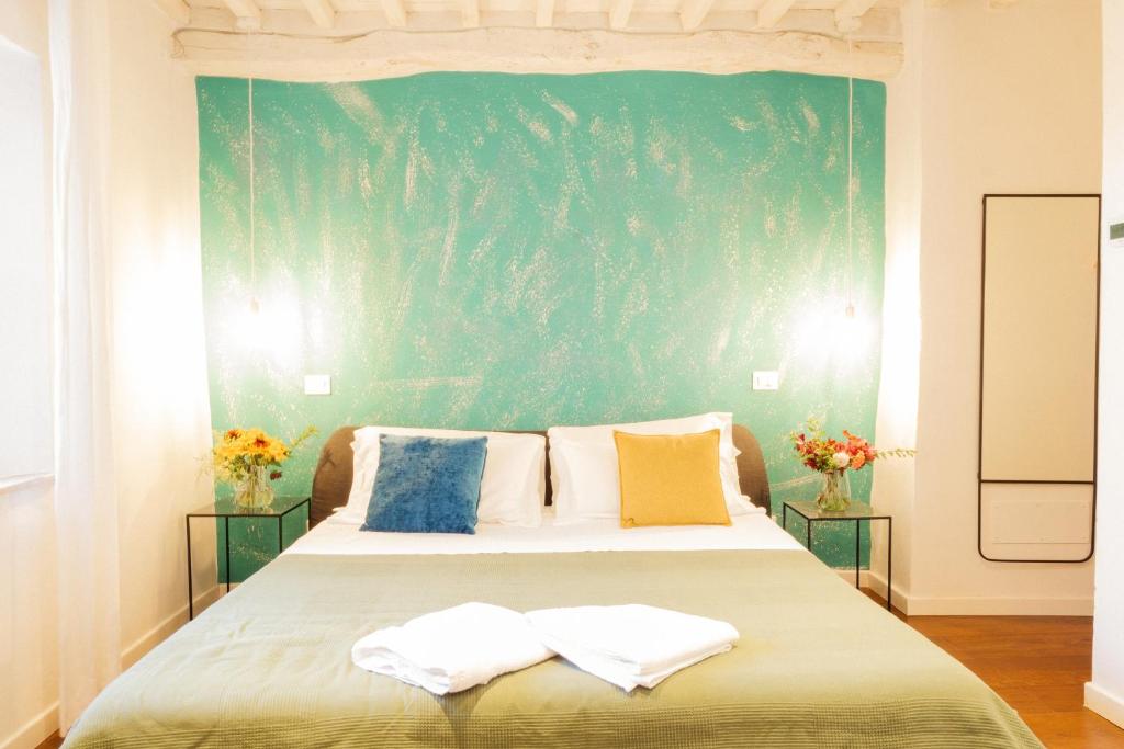 Postel nebo postele na pokoji v ubytování Incanto b&b