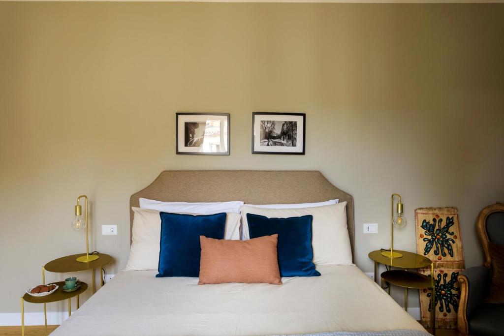 Postel nebo postele na pokoji v ubytování Sui Tetti di Balarm Boutique Rooms