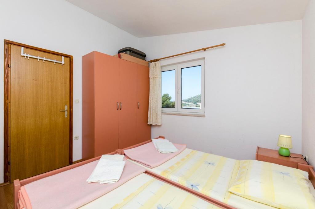 Posteľ alebo postele v izbe v ubytovaní Apartment Smiljana