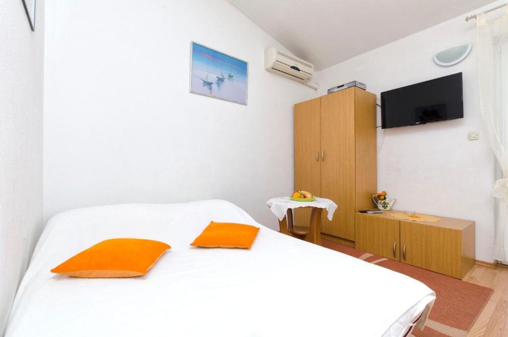 Posteľ alebo postele v izbe v ubytovaní Apartment Smiljana