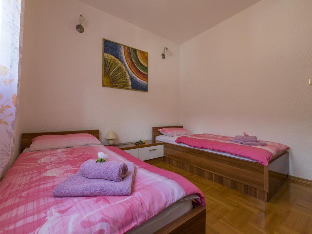 Postel nebo postele na pokoji v ubytování House Haus Rosa