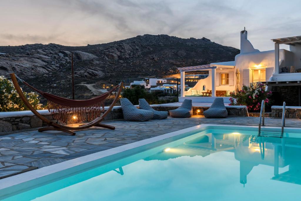 Villa con piscina y casa en Ikos residence en Mykonos ciudad