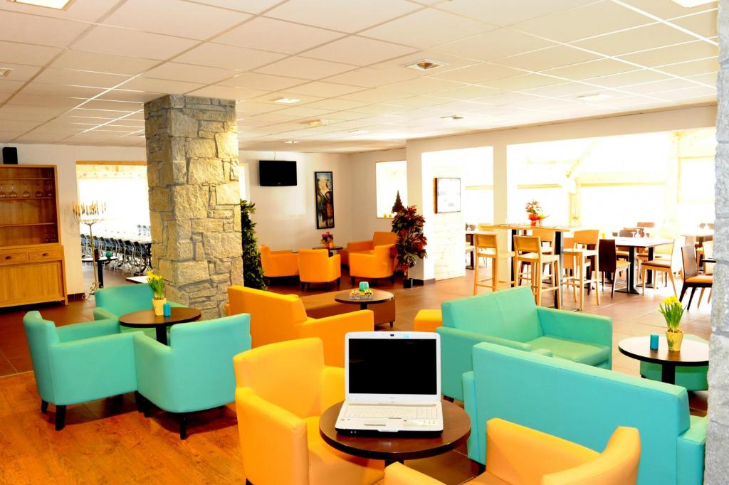Televízia a/alebo spoločenská miestnosť v ubytovaní Le Hameau SPA & PISCINE studio SUPERIEUR 2 pers by Alpvision Residences