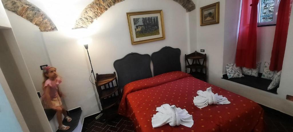 Postel nebo postele na pokoji v ubytování Vecchio Mulino Rosa
