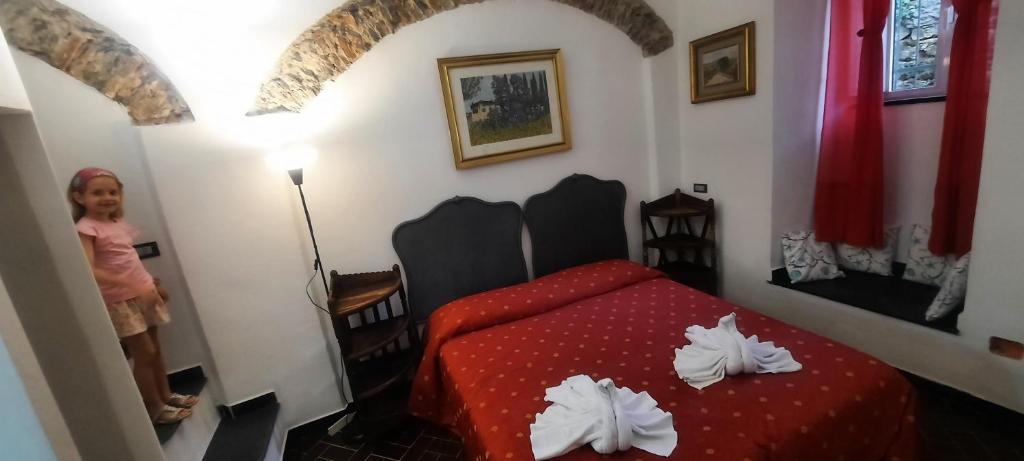 Postel nebo postele na pokoji v ubytování Vecchio Mulino Rosa