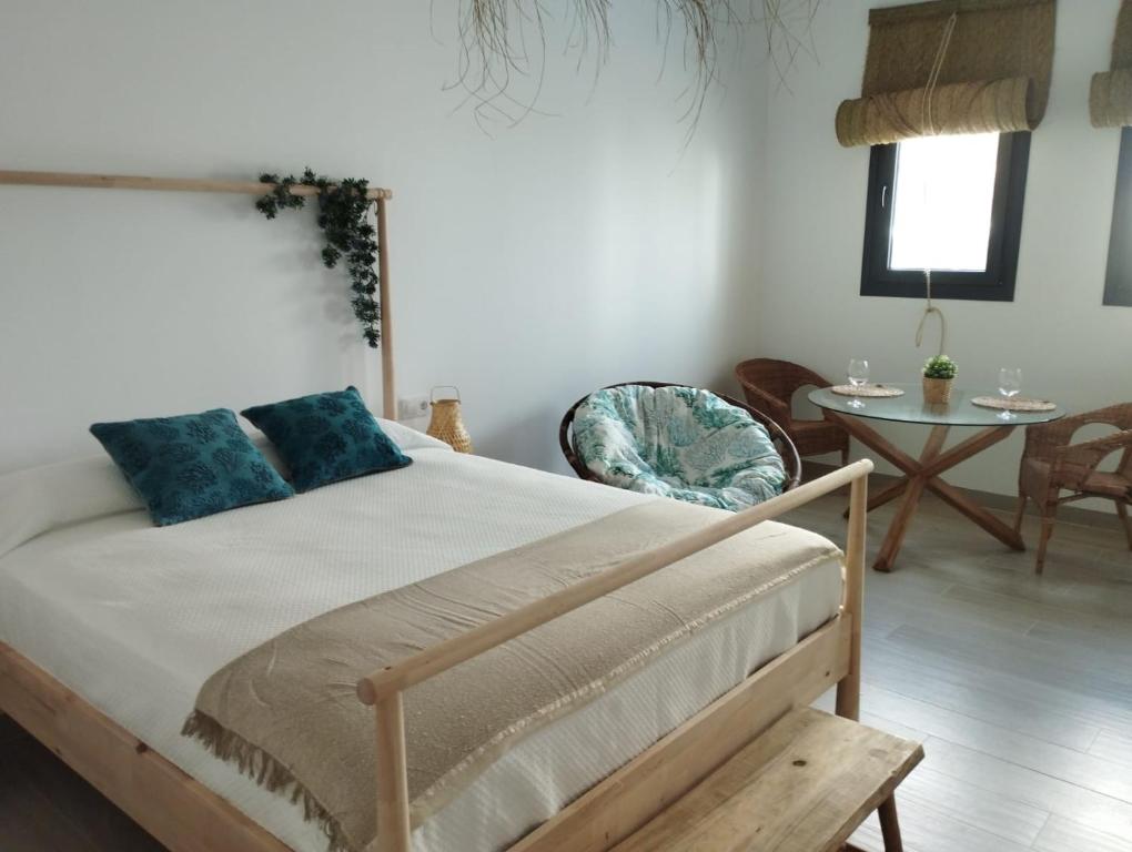 A bed or beds in a room at Mirador de Trafalgar Conil